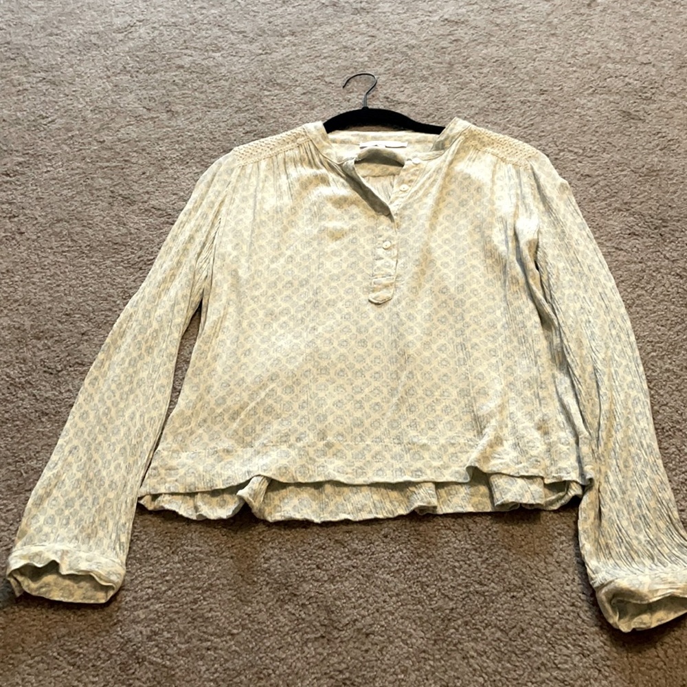 Cream and light blue print blouse with embroidery.